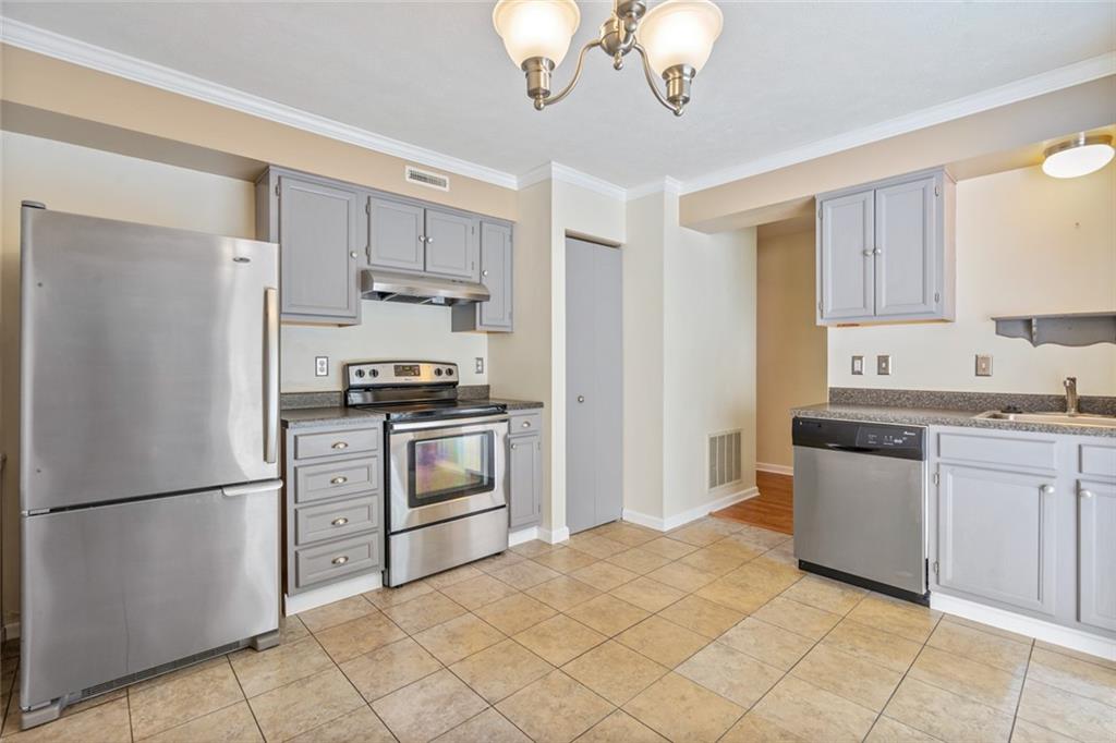 2003 Timber Trail Imperial, PA 15126 - Photo 7 of 18 a kitchen with cabinets and stainless steel appliances