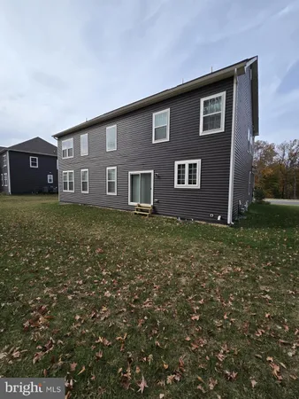 a front view of house with yard