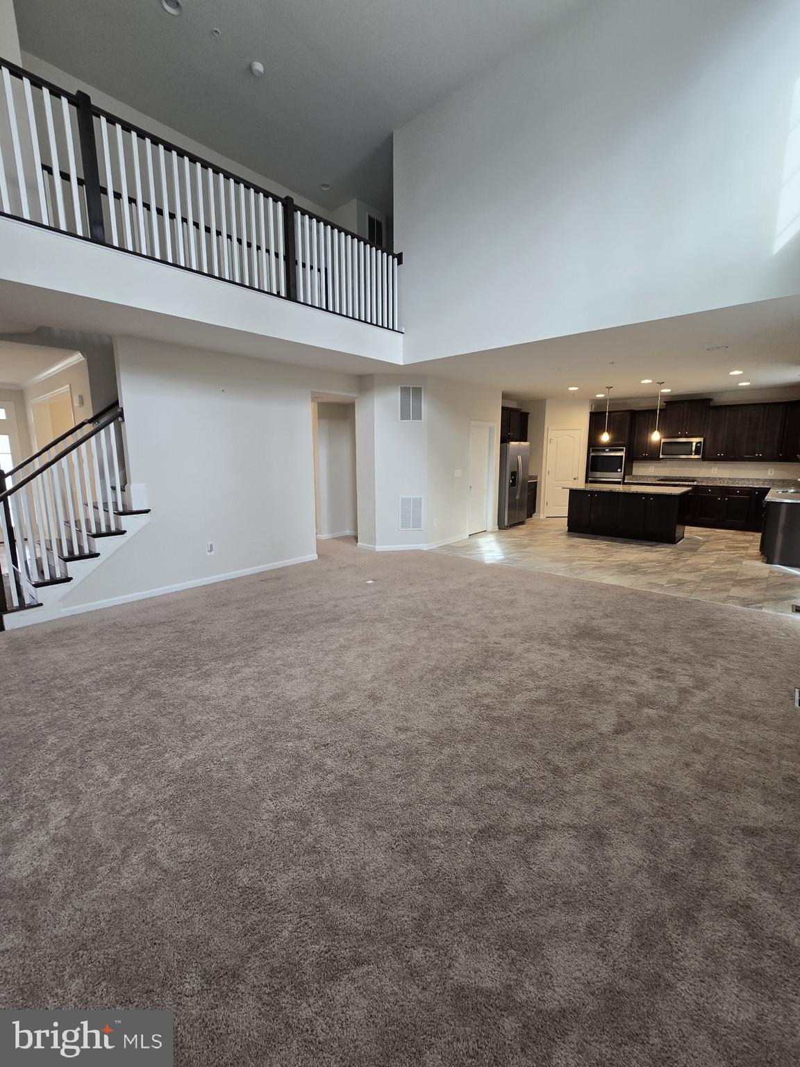 6592 Timber Ridge Lane Bryans Road, MD 20616 - Photo 23 of 60 a view of a livingroom with a staircase