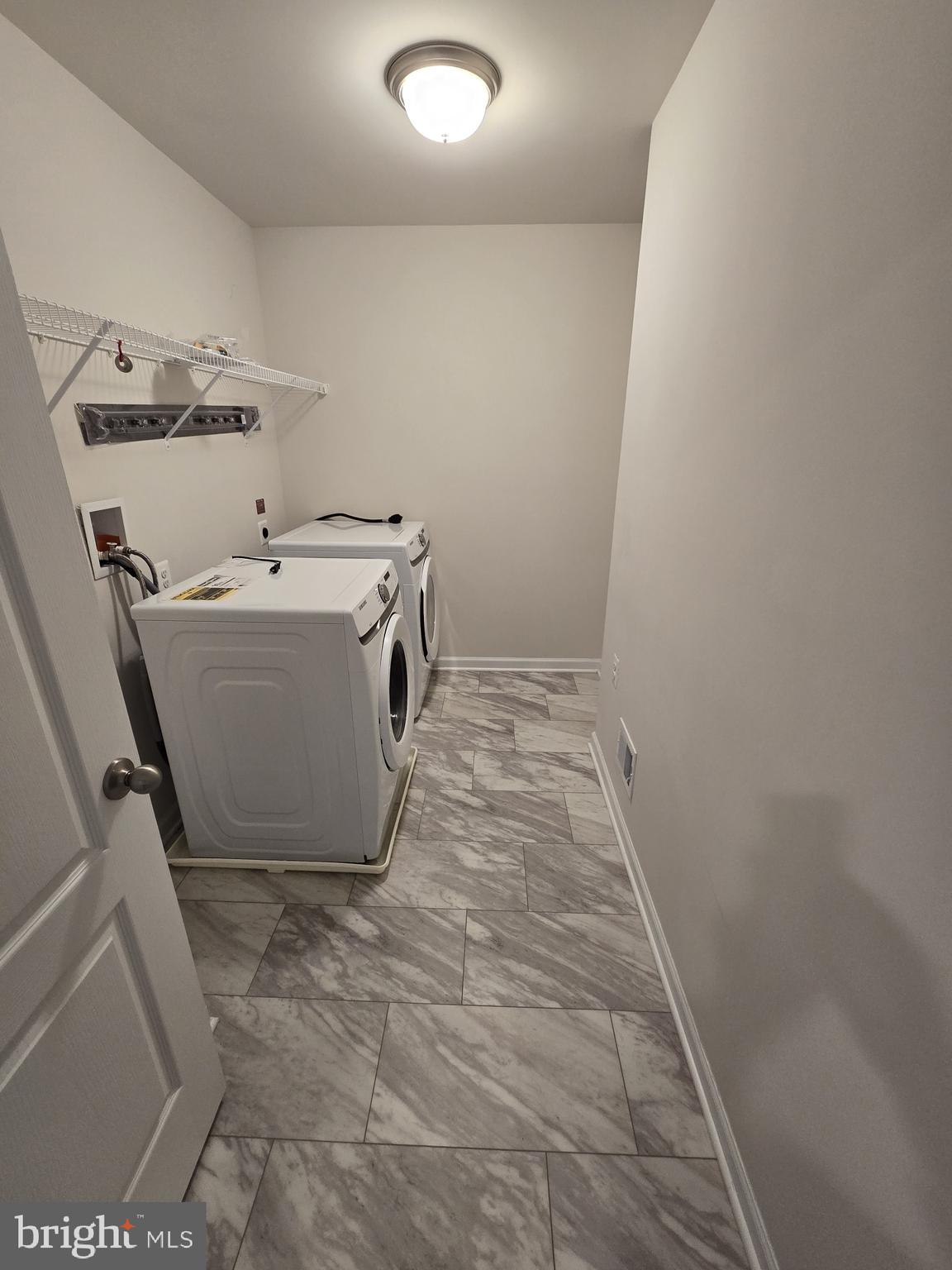 6592 Timber Ridge Lane Bryans Road, MD 20616 - Photo 31 of 60 a utility room with dryer and washer