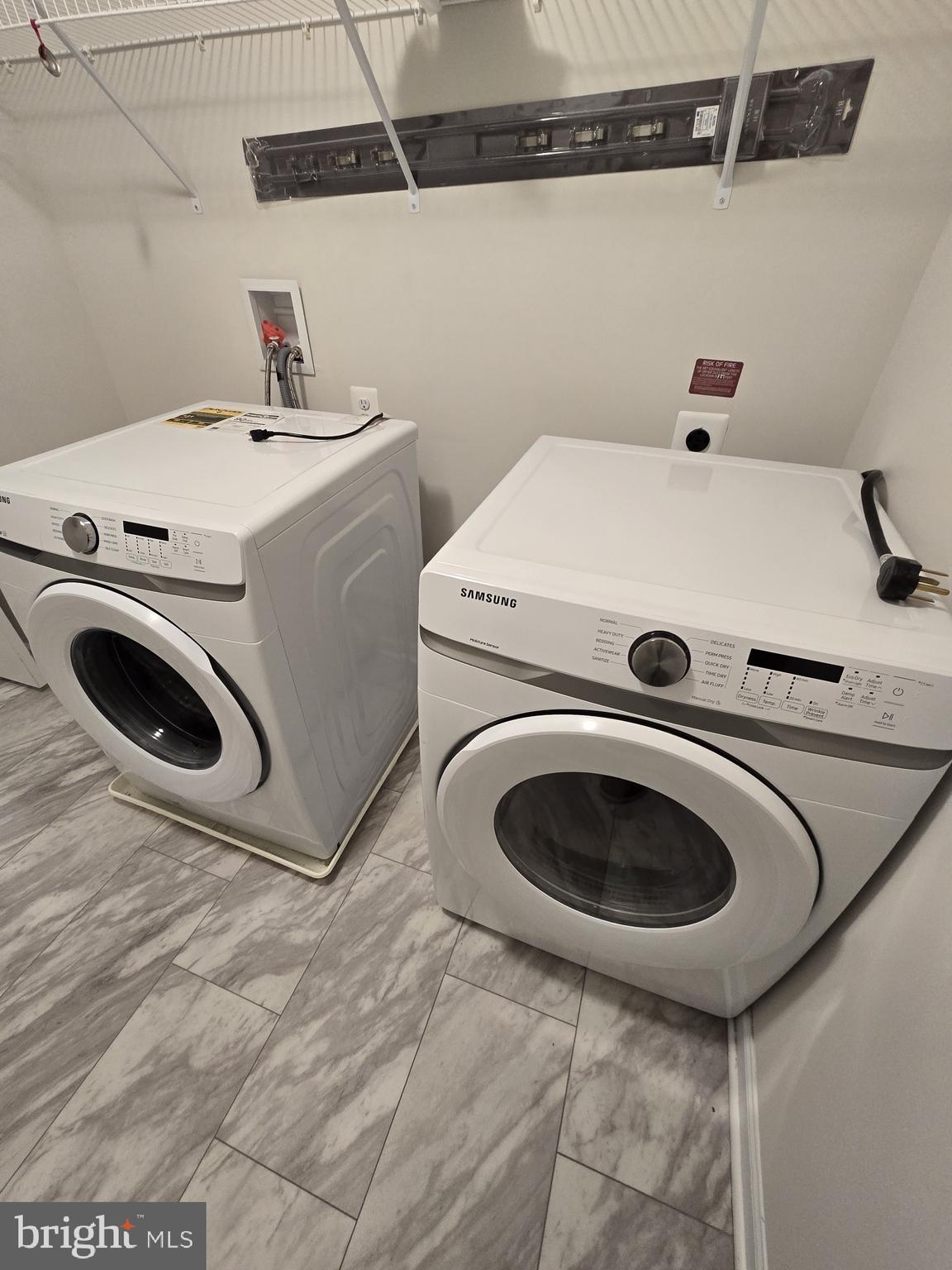 6592 Timber Ridge Lane Bryans Road, MD 20616 - Photo 32 of 60 a utility room with dryer and washer