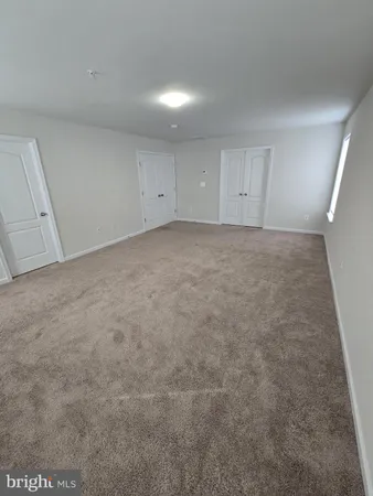 an empty room with a natural light