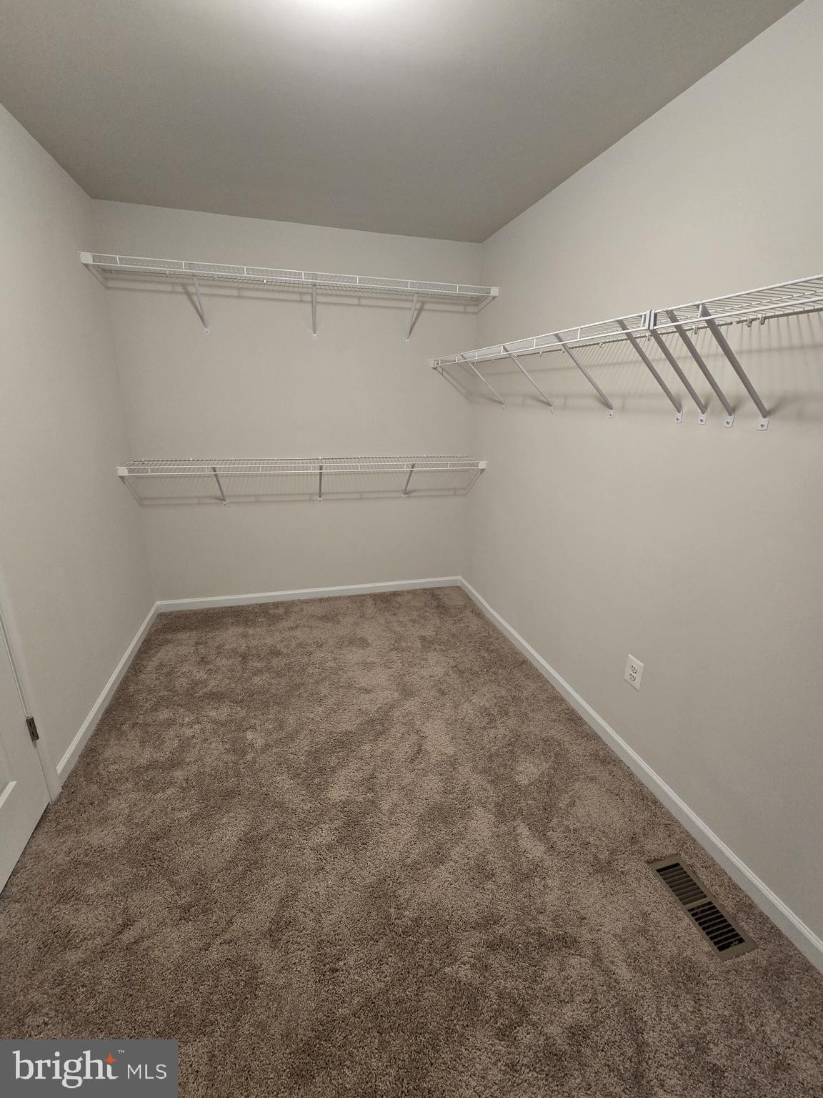 6592 Timber Ridge Lane Bryans Road, MD 20616 - Photo 37 of 60 a view of a room with racks on the wall