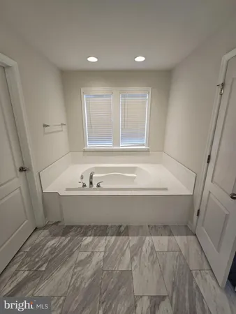 an empty room with an entryway