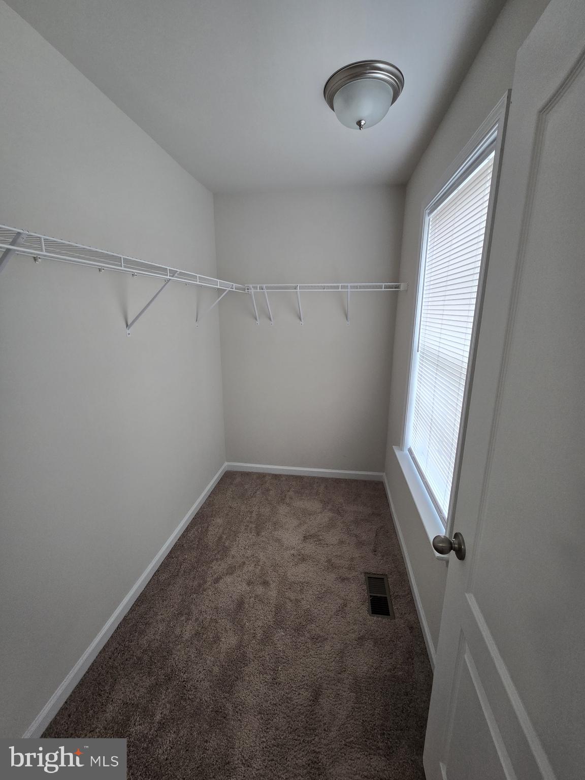 6592 Timber Ridge Lane Bryans Road, MD 20616 - Photo 43 of 60 an empty room with a empty space and a window