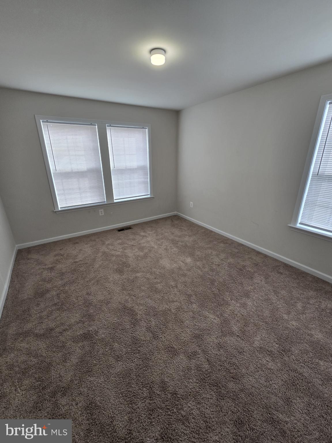 6592 Timber Ridge Lane Bryans Road, MD 20616 - Photo 44 of 60 an empty room with windows