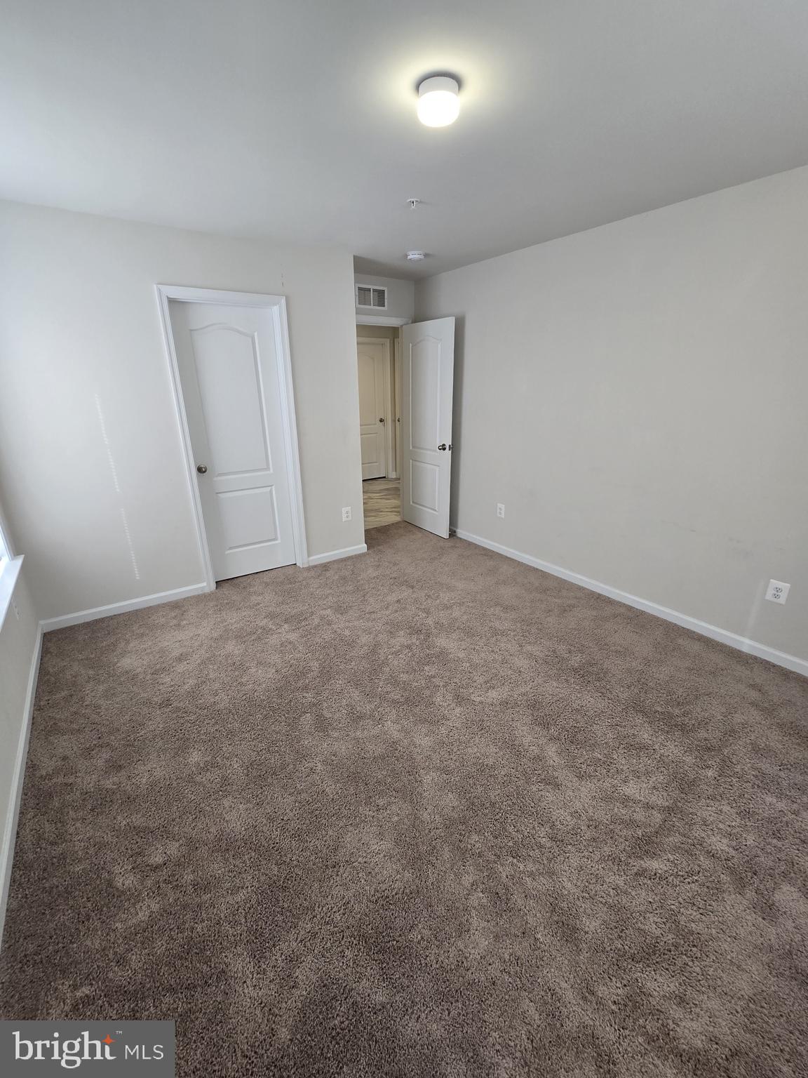 6592 Timber Ridge Lane Bryans Road, MD 20616 - Photo 46 of 60 an empty room with an entryway