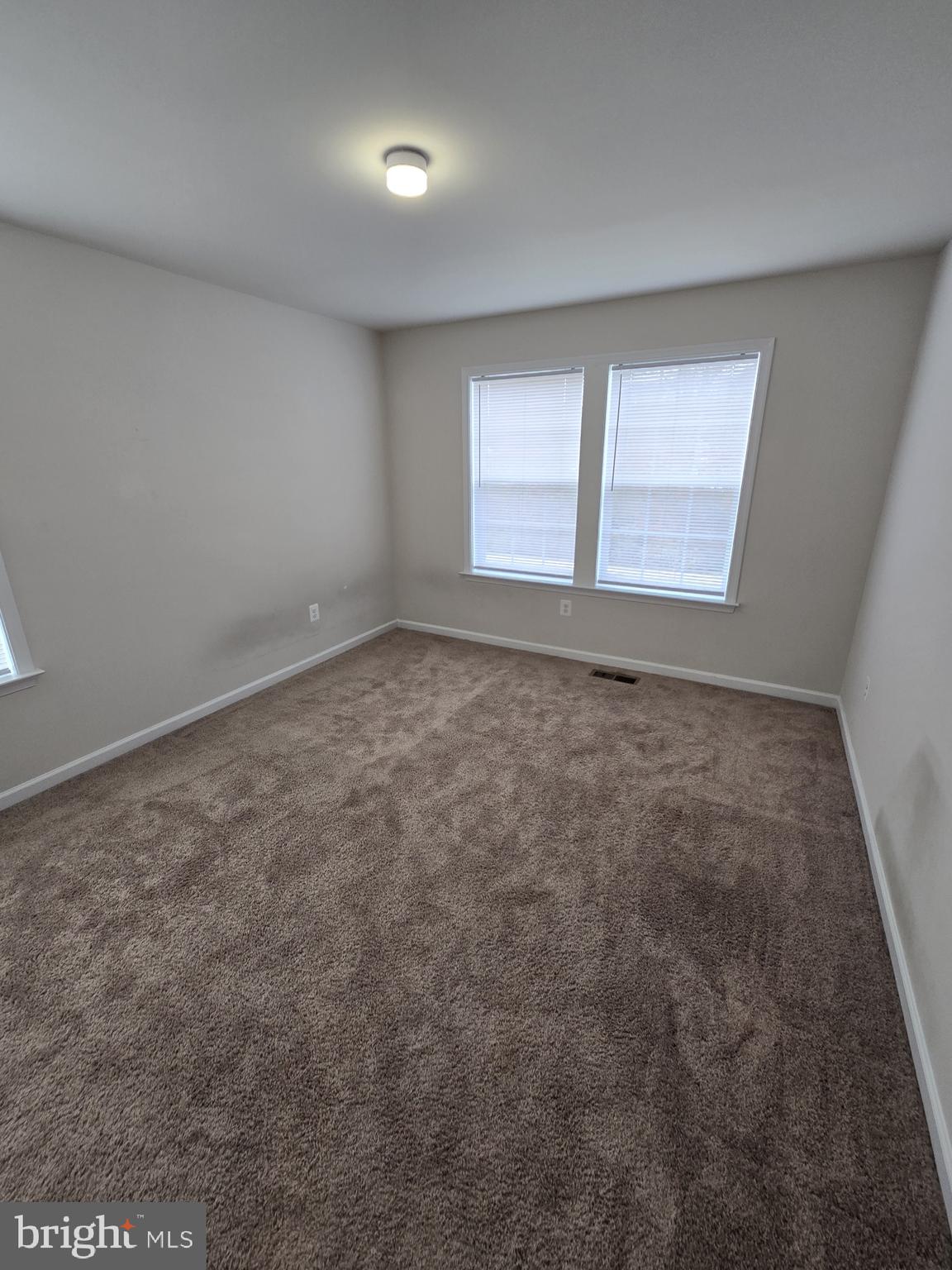 6592 Timber Ridge Lane Bryans Road, MD 20616 - Photo 48 of 60 an empty room with windows