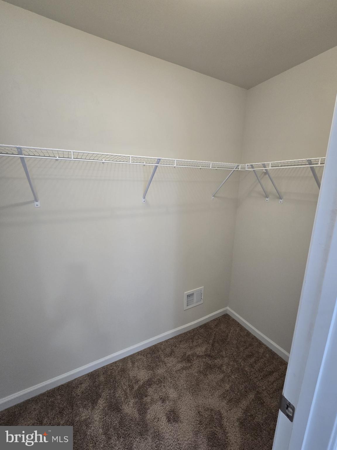 6592 Timber Ridge Lane Bryans Road, MD 20616 - Photo 50 of 60 a view of a room with racks on the wall