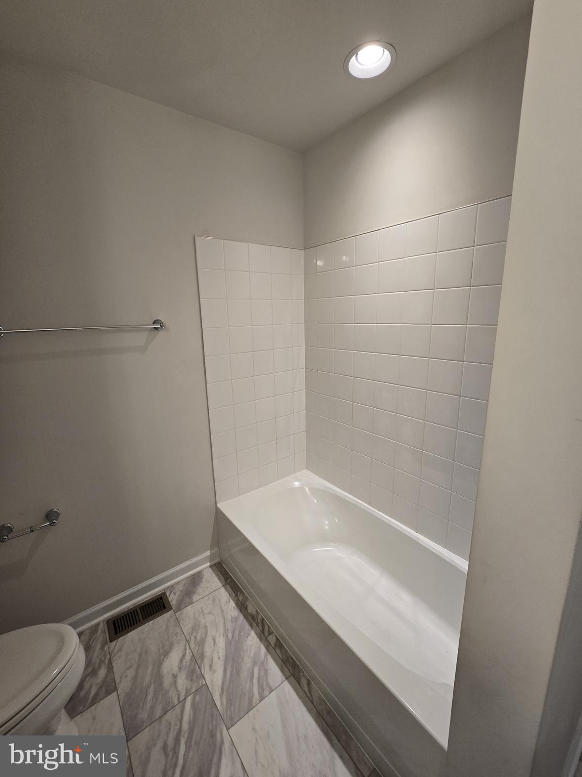 6592 Timber Ridge Lane Bryans Road, MD 20616 - Photo 52 of 60 a bathroom with a bathtub and a toilet