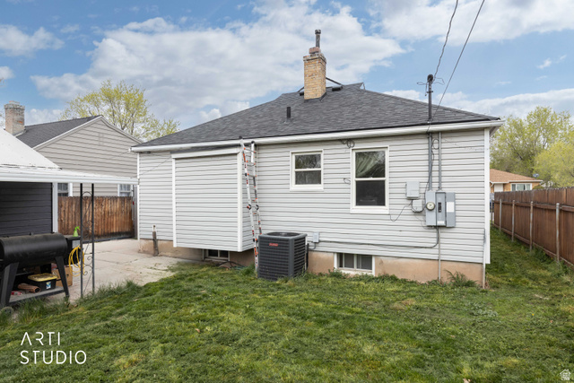 875 Patterson Street Ogden, UT 84403 - Photo 30 of 38 Rear view of property featuring a chimney and roof with shingles