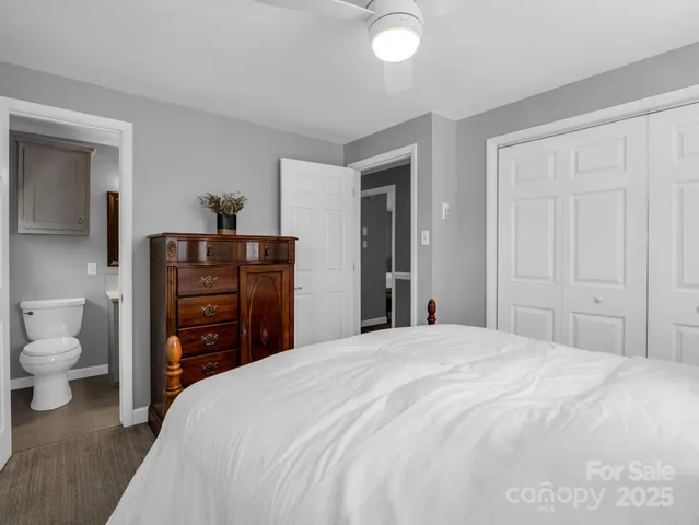 a bathroom with 2 sink and a mirror