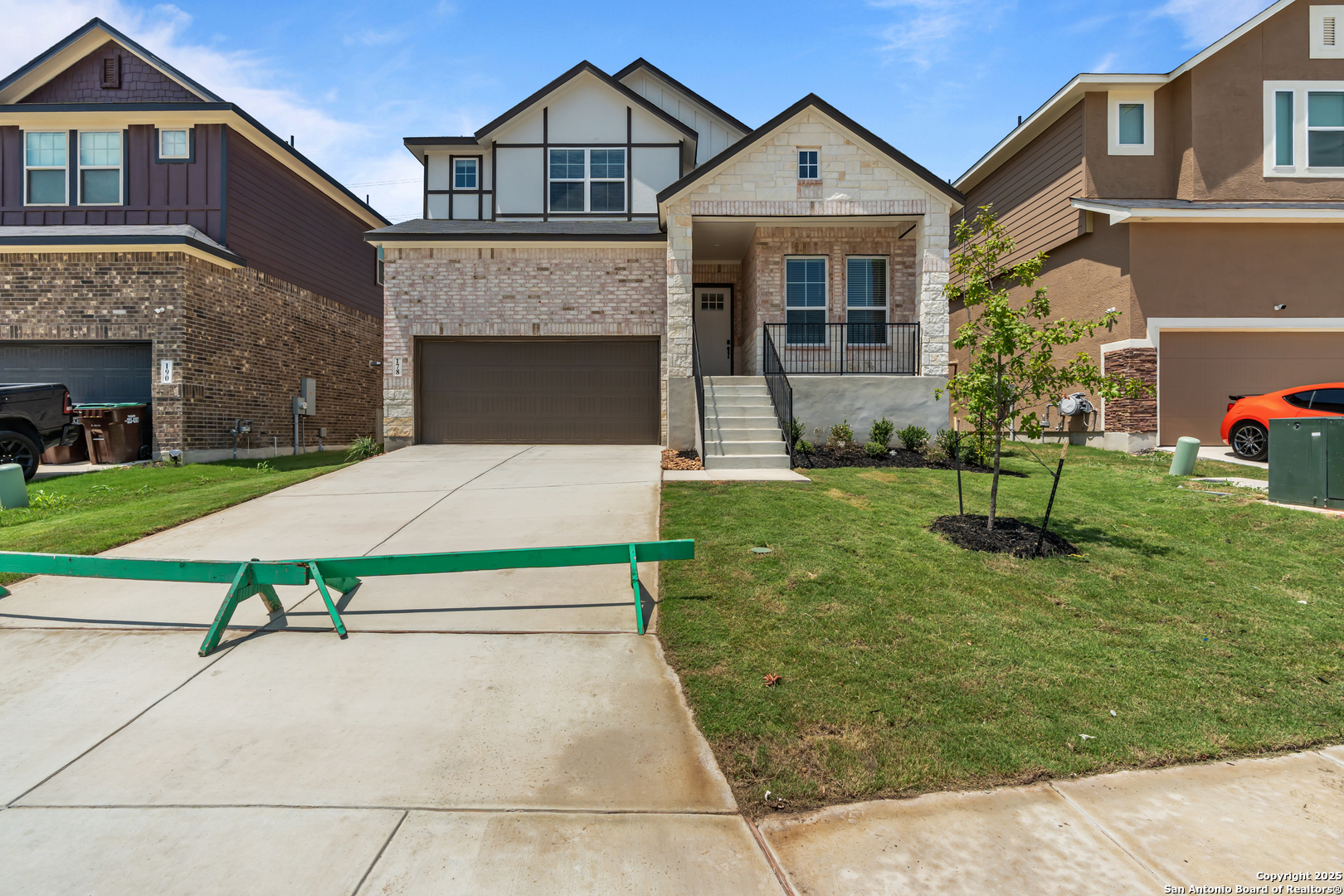a house view with a garden space