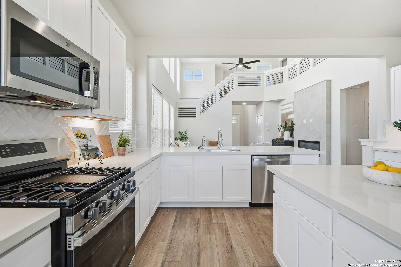 178 Jax Loop San Antonio, TX 78253 - Photo 18 of 45 a kitchen with a stove and a sink