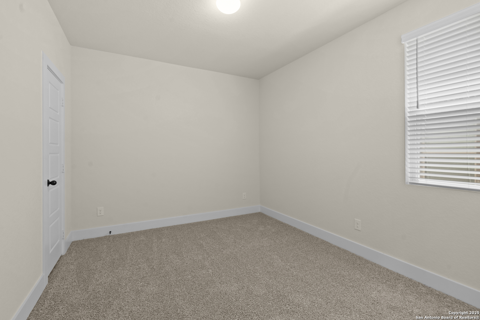 178 Jax Loop San Antonio, TX 78253 - Photo 30 of 45 an empty room with a window