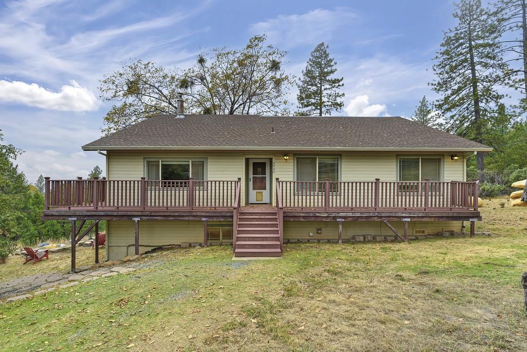 2930 Holloway Drive Georgetown, CA 95634 - Photo 12 of 93 a front view of a house with a yard table and chairs