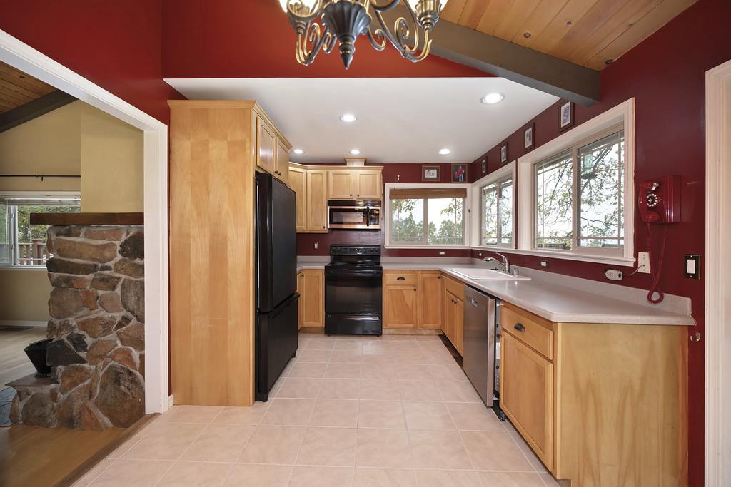 2930 Holloway Drive Georgetown, CA 95634 - Photo 21 of 93 a large kitchen with stainless steel appliances granite countertop a large counter top space a sink and a refrigerator