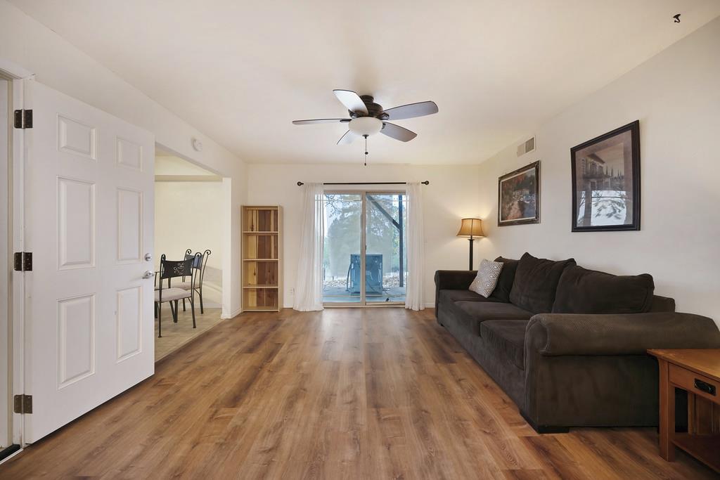 2930 Holloway Drive Georgetown, CA 95634 - Photo 37 of 93 a living room with furniture and a wooden floor