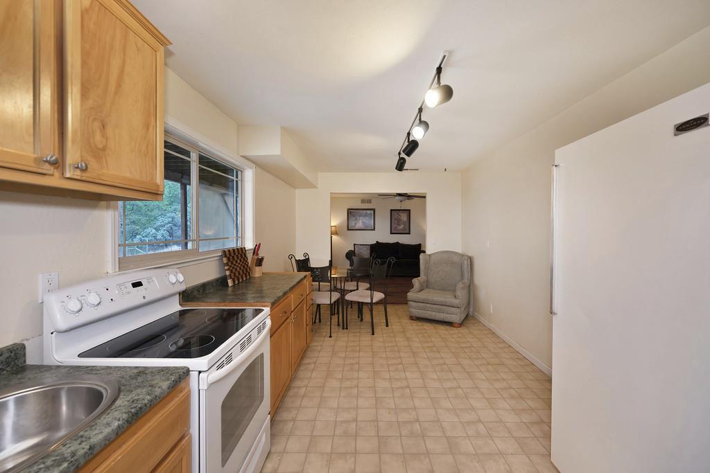 2930 Holloway Drive Georgetown, CA 95634 - Photo 42 of 93 a kitchen with a sink appliances and cabinets