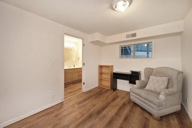 a view of a yard with a tree