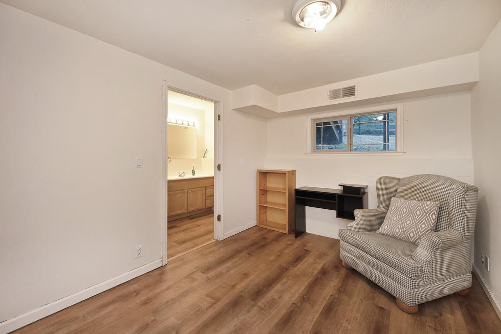2930 Holloway Drive Georgetown, CA 95634 - Photo 46 of 93 a living room with furniture and a wooden floor