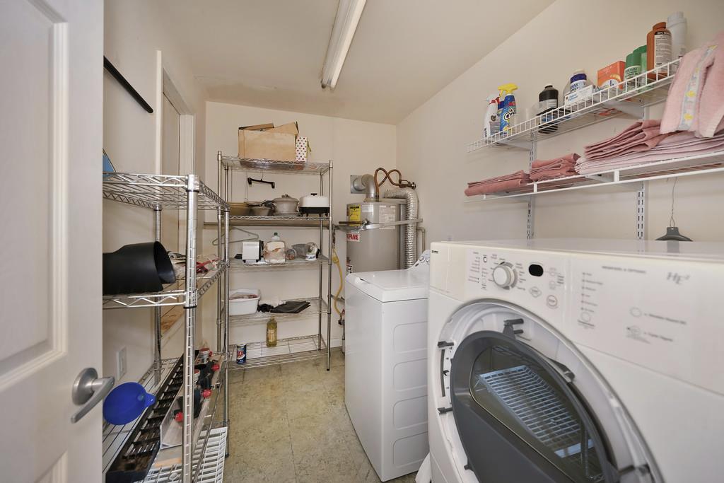 2930 Holloway Drive Georgetown, CA 95634 - Photo 47 of 93 a view of kitchen and washer and dryer
