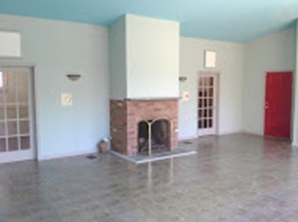 180 South Ashfield Road Conway, MA 01096 - Photo 5 of 30 an empty room with furniture and a fireplace