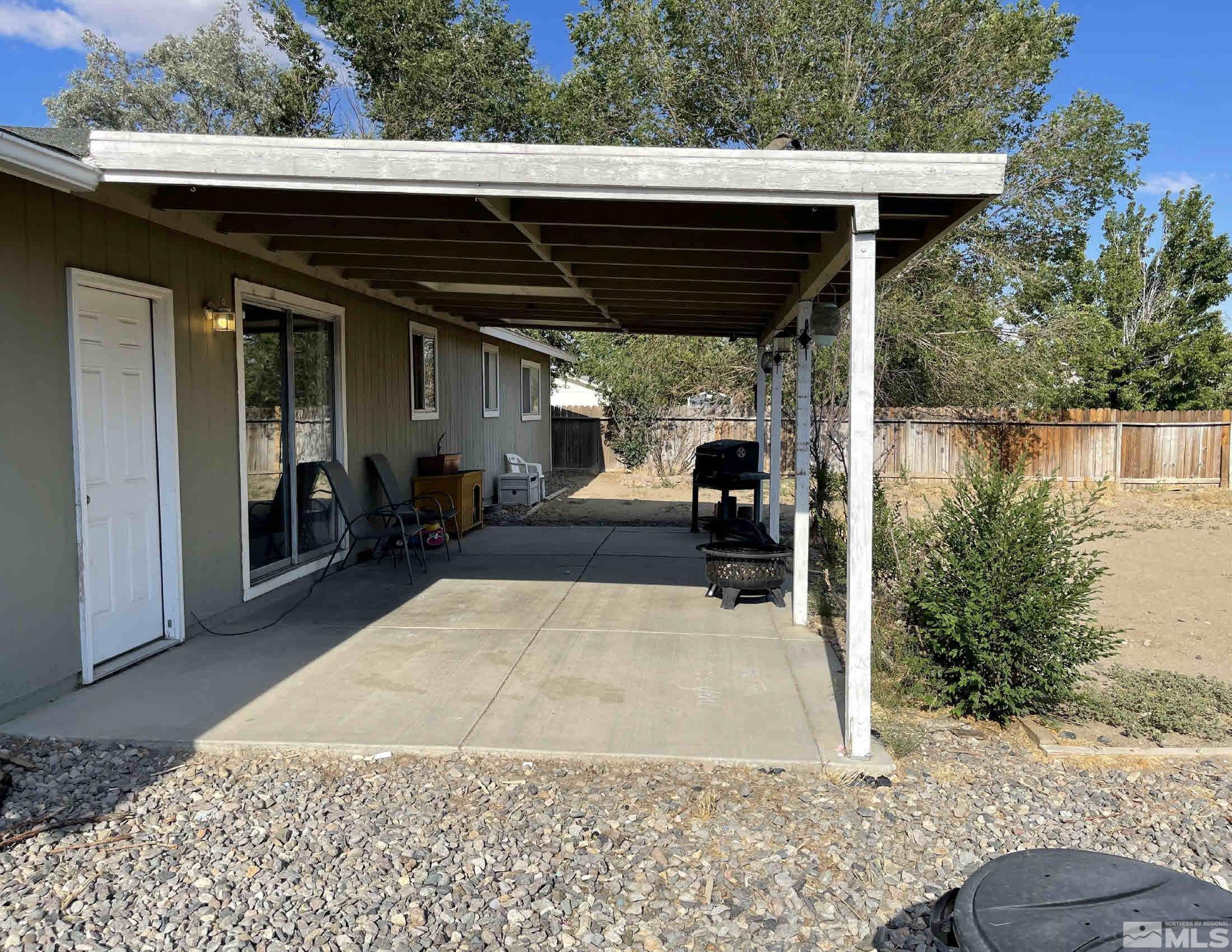 703 Empire Road Dayton, NV 89403 - Photo 7 of 31 a view of outdoor space with porch and furniture