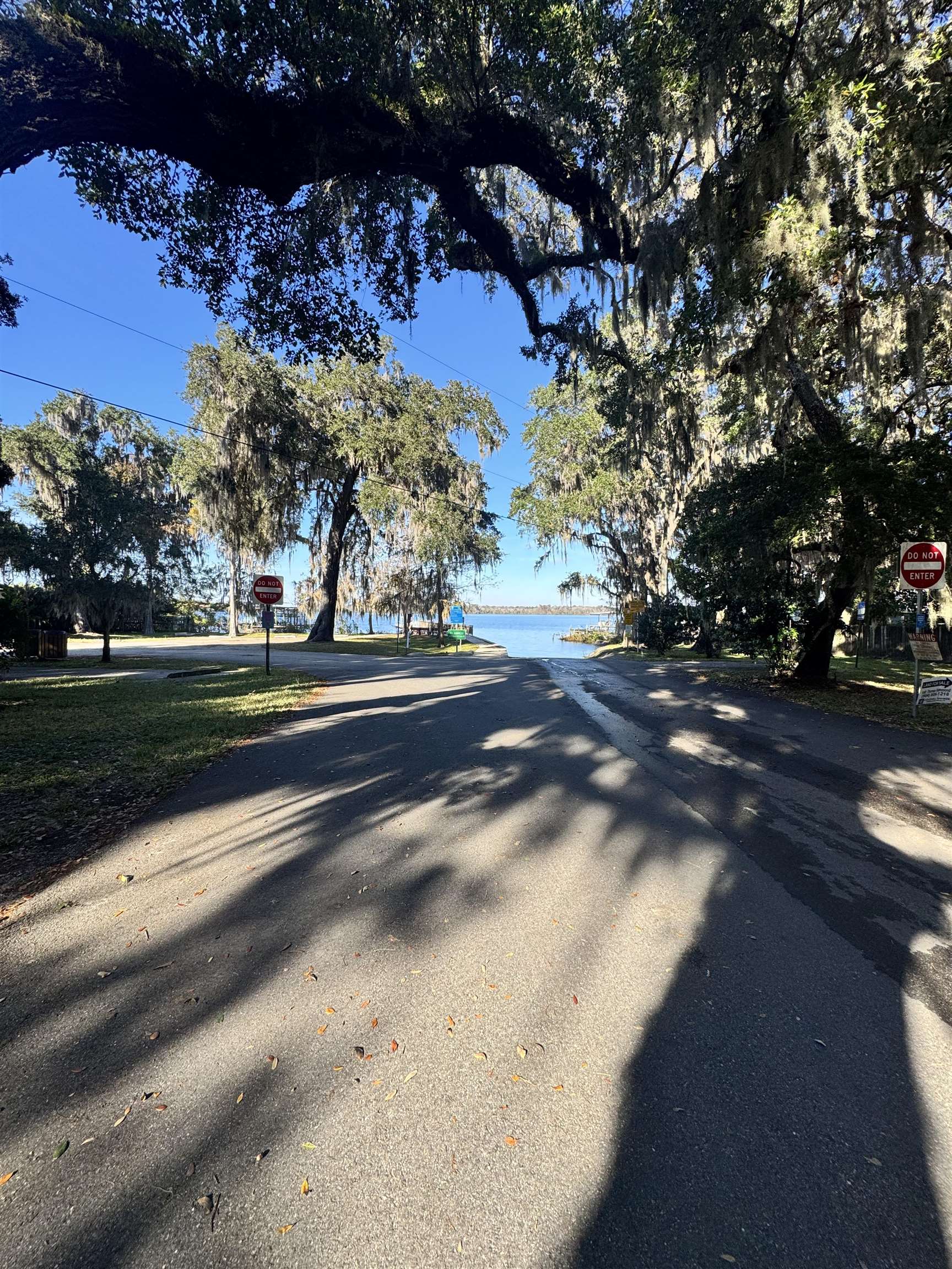8550 Palmo Fish Camp Road, Unit 1 St. Augustine, FL 32092 - Photo 11 of 20 a view of street with yard and car parked