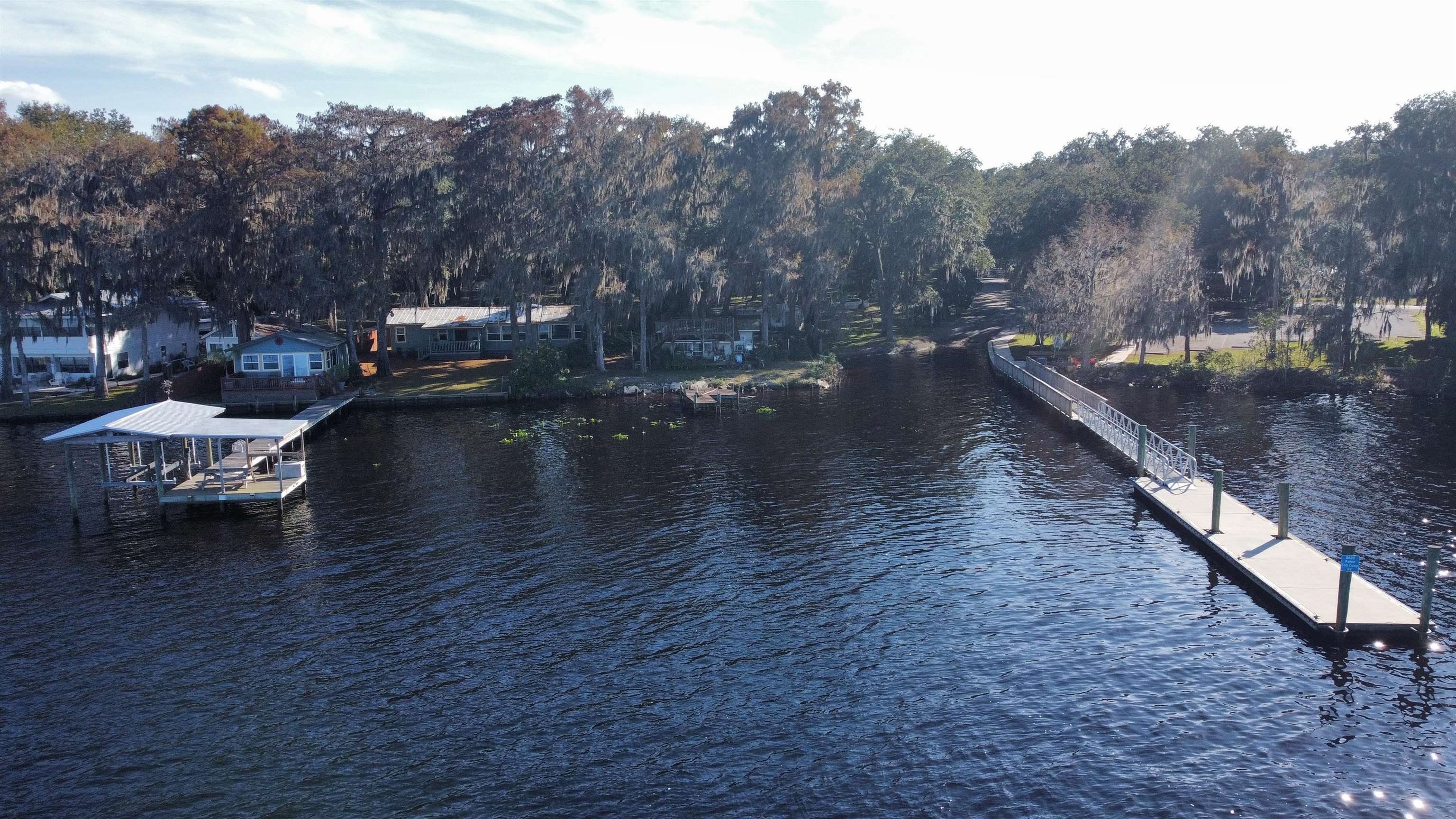 8550 Palmo Fish Camp Road, Unit 1 St. Augustine, FL 32092 - Photo 4 of 20 a view of a lake with a mountain