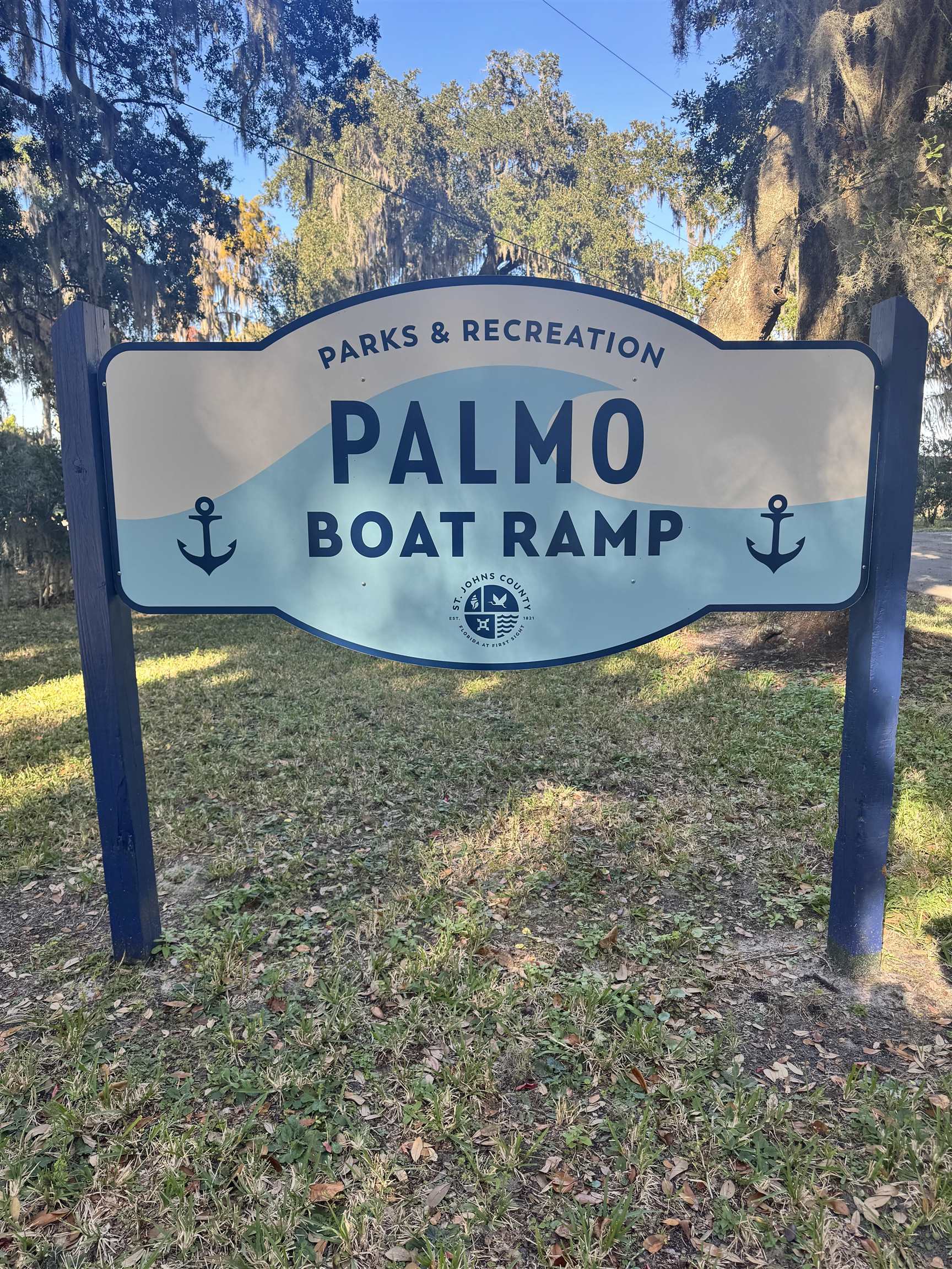 8550 Palmo Fish Camp Road, Unit 1 St. Augustine, FL 32092 - Photo 10 of 20 a view of a sign on the side of the road