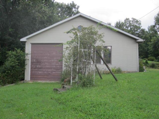 8811 Greenbriar Road Waverly, TN 37185 - Photo 29 of 30 Detached workshop/garage (48x32) Lots of room for boats cars, motor home, etc.