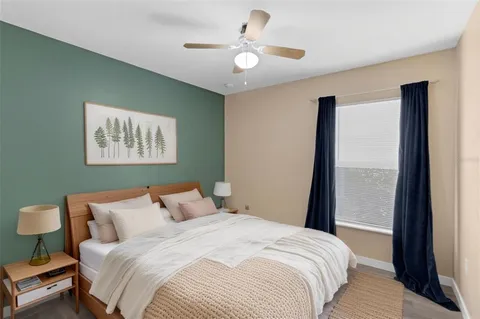 a bathroom with a bath tub and shower