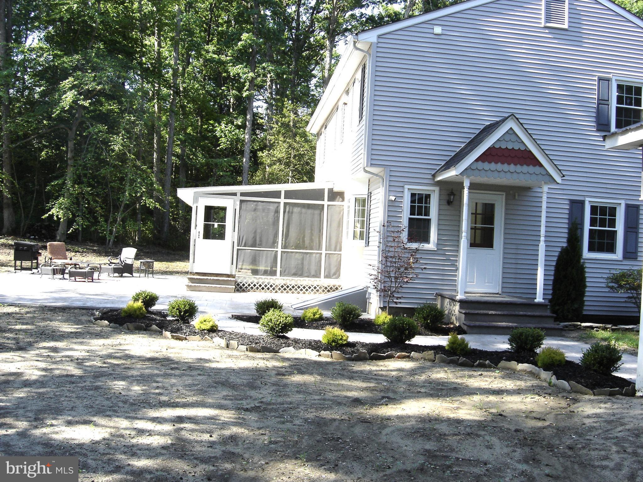 1306 Commissioners Road Mullica Hill, NJ 08062 - Photo 2 of 27 Exterior Side Door