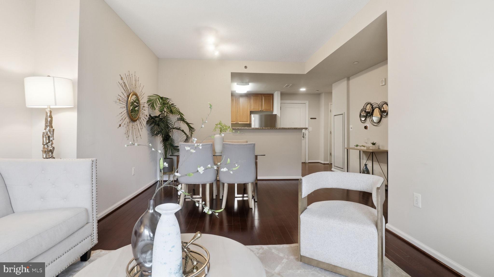 11700 Old Georgetown Road, Unit 1007 North Bethesda, MD 20852 - Photo 5 of 36 Modern elegance in open living space.