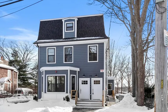 a front view of a house with street