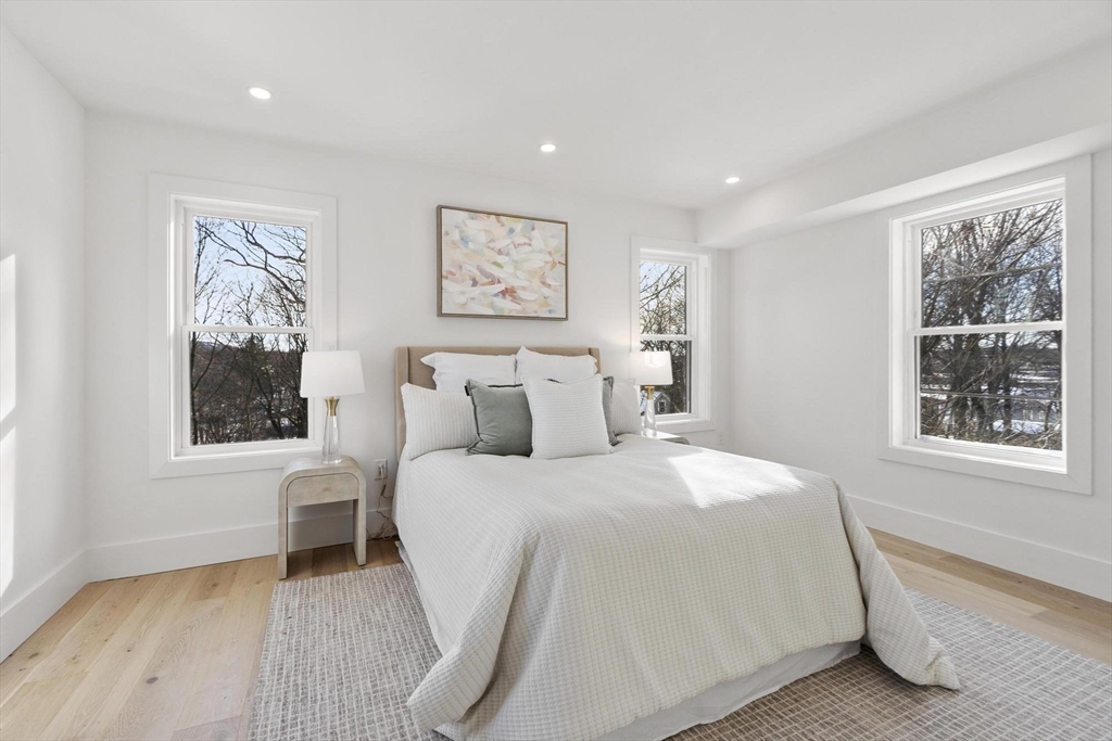 79 Maple Street, Unit 3 Boston, MA 02136 - Photo 6 of 13 a bedroom with a bed and a window