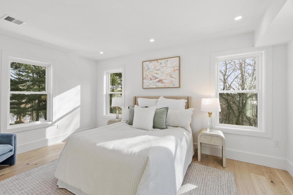 79 Maple Street, Unit 3 Boston, MA 02136 - Photo 7 of 13 a bedroom with a large bed and a window