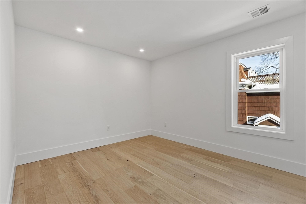 79 Maple Street, Unit 3 Boston, MA 02136 - Photo 10 of 13 a view of empty room with window