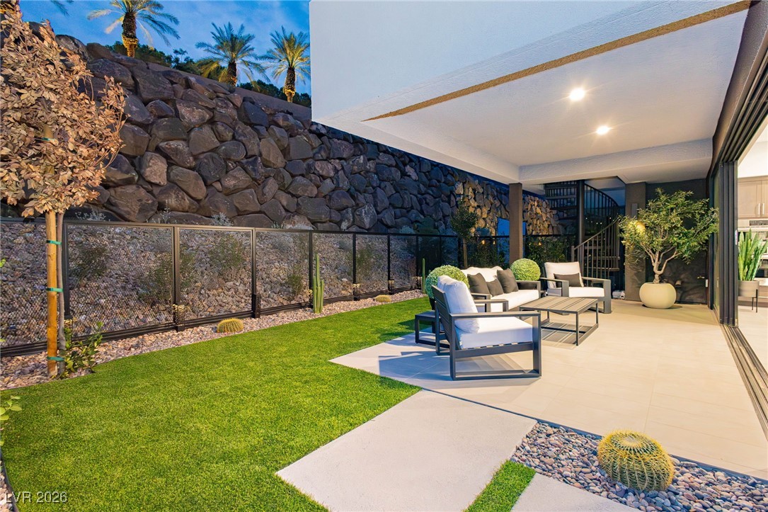 13 Promenade Isle Lane Henderson, NV 89011 - Photo 36 of 52 Patio with yard