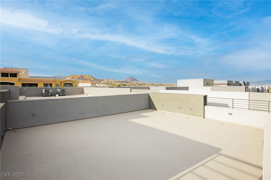 13 Promenade Isle Lane Henderson, NV 89011 - Photo 51 of 52 Deck top patio with valley views.