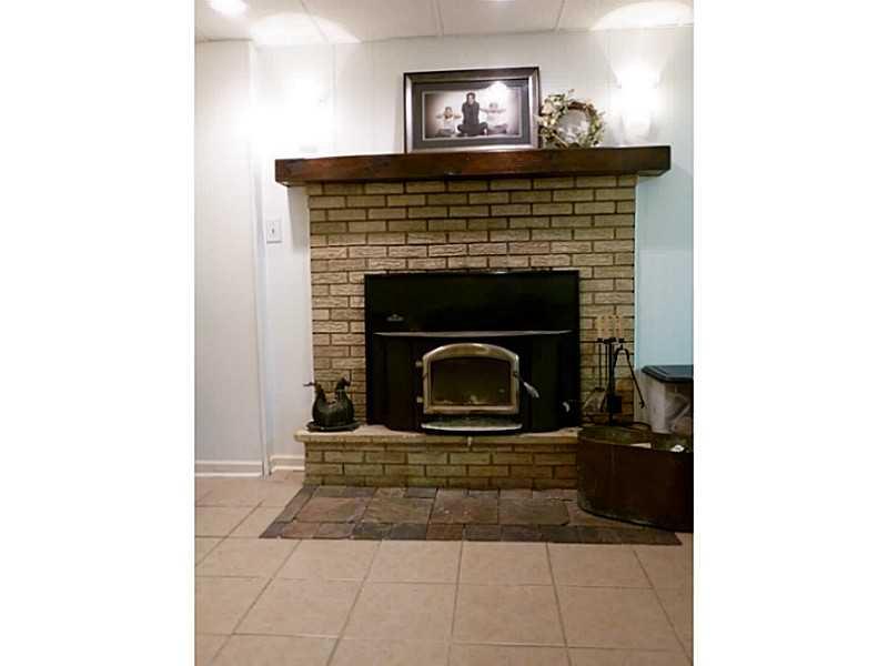 15 Spring Run Road Greensburg, PA 15601 - Photo 20 of 25 Basement/Game Room. log burning fireplace
