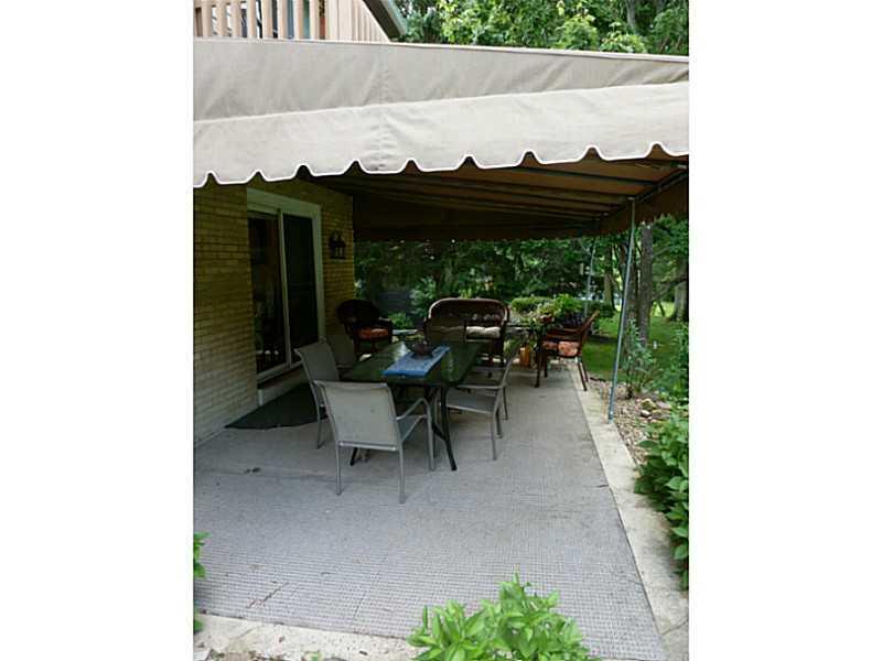 15 Spring Run Road Greensburg, PA 15601 - Photo 22 of 25 Exterior Back. Awning covered cement back patio