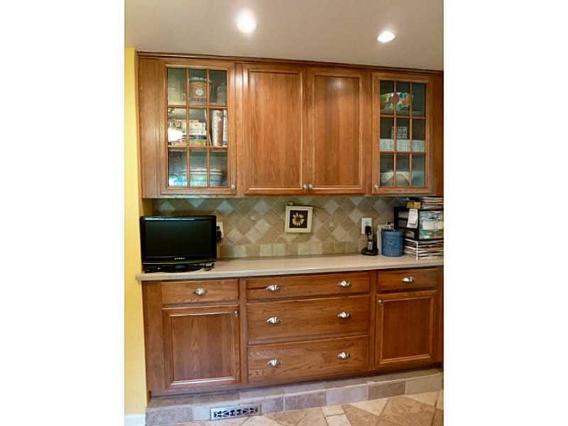 15 Spring Run Road Greensburg, PA 15601 - Photo 5 of 25 Kitchen. additional wall of cabinets with glass display cupboards.