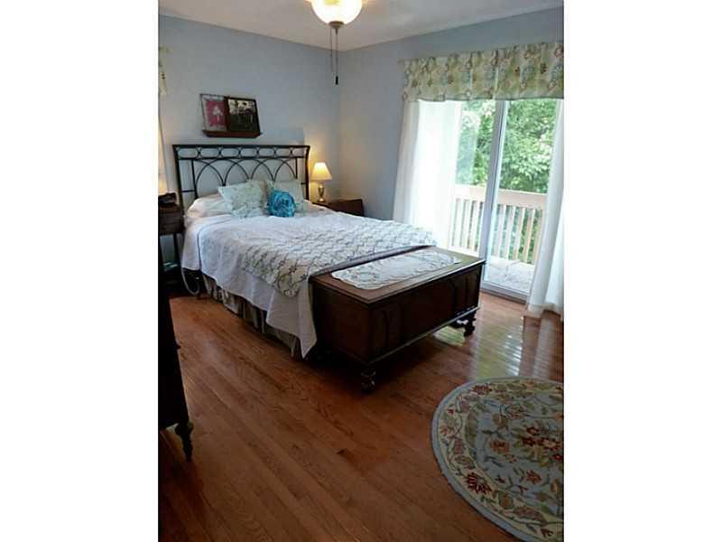 15 Spring Run Road Greensburg, PA 15601 - Photo 9 of 25 Master Bedroom. Hardwood floors. Sliding glass doors lead to a small deck for relaxing.