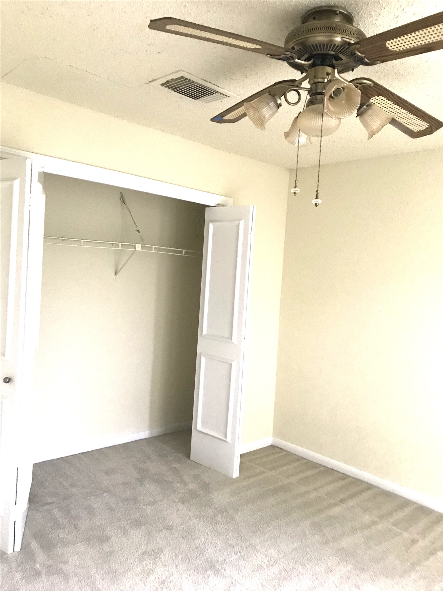 14702 Rancho Vista Drive Houston, TX 77083 - Photo 6 of 11 Bedroom with ceiling fan.