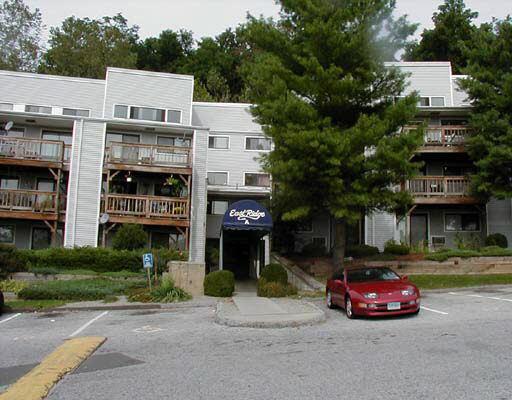 5 Nabby Road, Unit A39 Danbury, CT 06811 - Photo 1 of 1 a car parked in front of a building