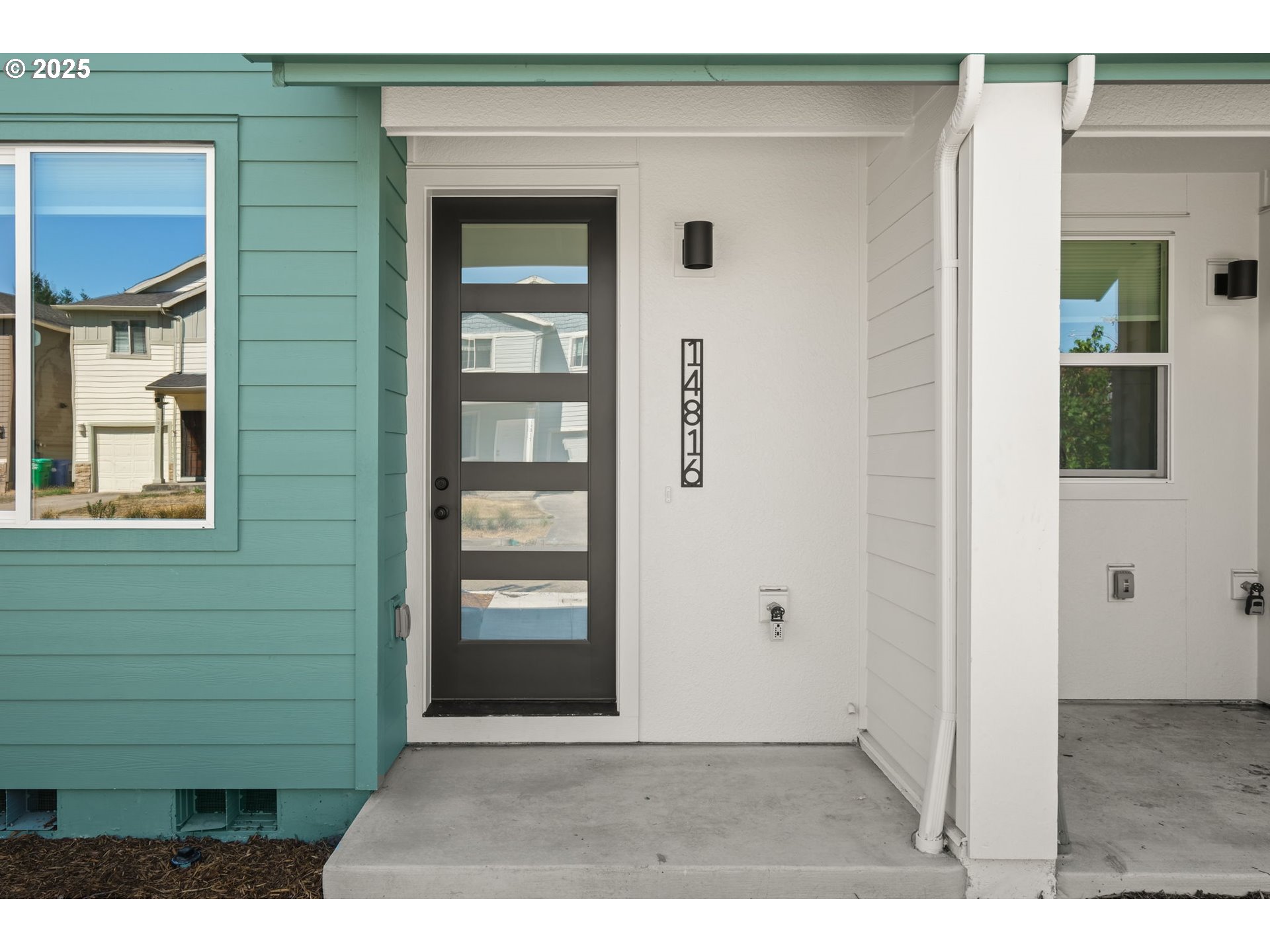 14816 Northeast Couch Street, Unit 3 Portland, OR 97230 - Photo 1 of 42 a view of outdoor space and a garage