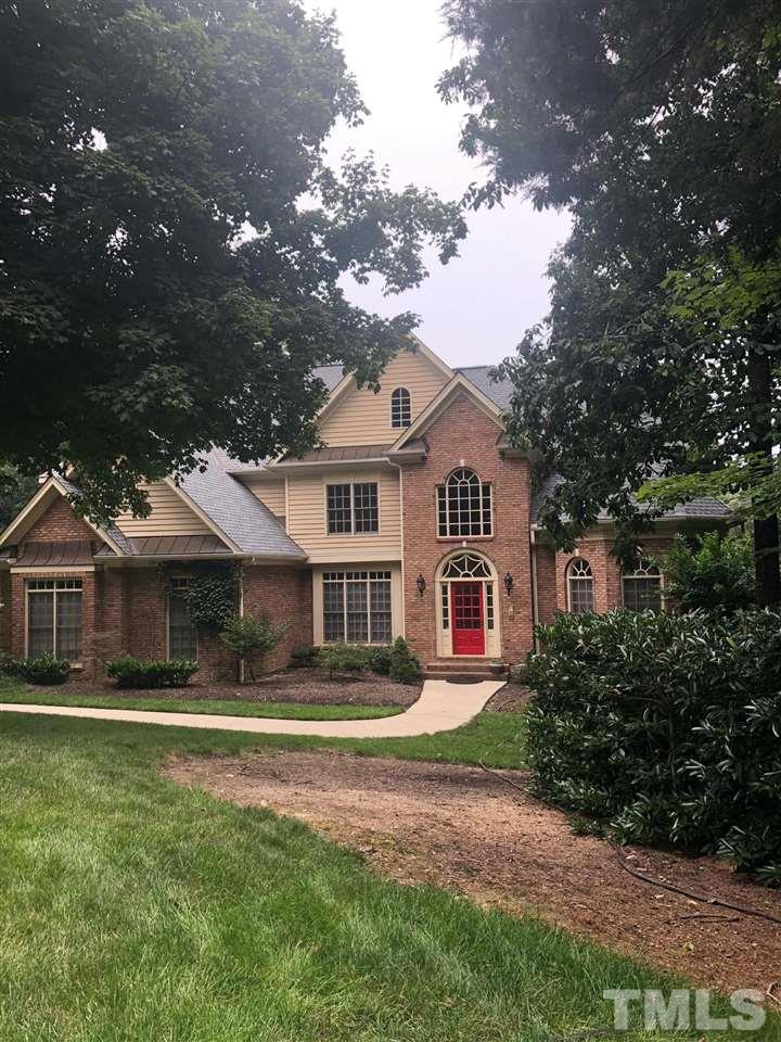 1126 Stonebridge Drive Durham, NC 27712 - Photo 4 of 29 a front view of a house with a yard