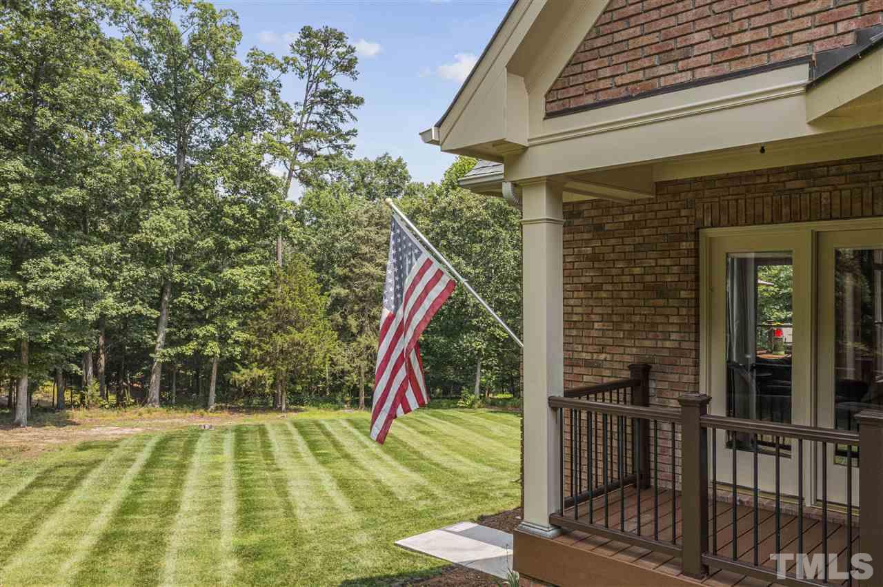 1126 Stonebridge Drive Durham, NC 27712 - Photo 8 of 29 a view of a house with a backyard